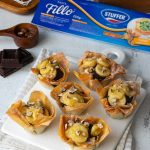 Cestini di pasta fillo con crema al cioccolato banane caramellate e nocciole